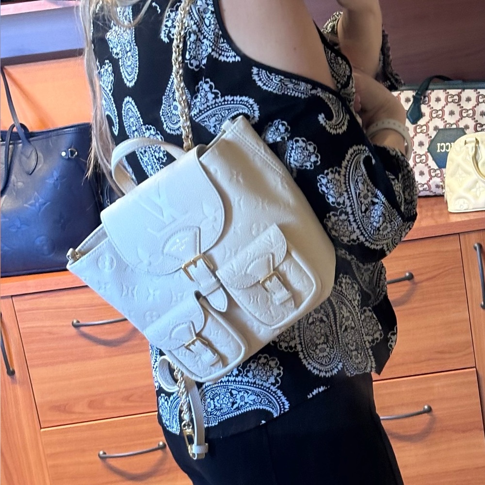 Stunning Louis Vuitton Backup Backpack Empreinte Cream